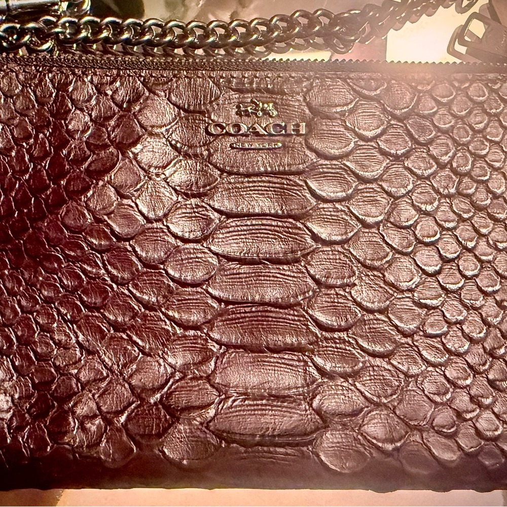 Coach Burgundy Embossed Leather Clutch